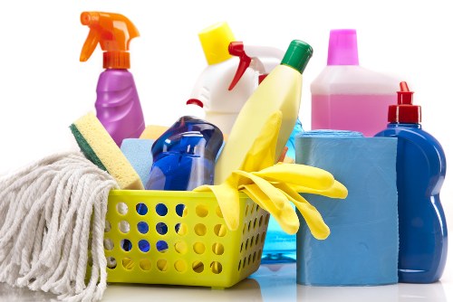 Carpet cleaning technician preparing a room for treatment