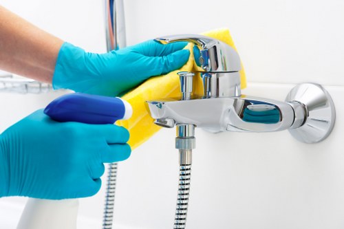 Cleaning team handling service cancellation and rescheduling paperwork